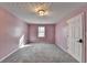 Charming bedroom with soft pink walls and natural light, creating a peaceful and inviting atmosphere at 3075 Superior Dr, Dacula, GA 30019