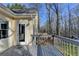Back deck overlooking the yard and wooded area, with access to the house at 3075 Superior Dr, Dacula, GA 30019