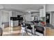 Bright kitchen with a large center island, modern hardware, and stainless steel sink at 3075 Superior Dr, Dacula, GA 30019