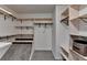 Spacious walk-in closet with custom shelving at 3075 Superior Dr, Dacula, GA 30019