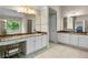 Spacious bathroom with granite countertops, dual sinks, and a makeup area, offering a luxurious feel at 3962 Coventry Park Ln, Peachtree Corners, GA 30096