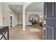 Inviting entryway showcasing hardwood floors and a view of the living and dining spaces at 3962 Coventry Park Ln, Peachtree Corners, GA 30096