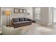 Comfortable living room with hardwood floors, neutral walls, and stylish decor at 3962 Coventry Park Ln, Peachtree Corners, GA 30096