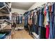 Organized walk-in closet with ample storage space, featuring racks and shelves for clothes and accessories at 3962 Coventry Park Ln, Peachtree Corners, GA 30096