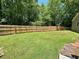 Spacious backyard with well-maintained lawn and privacy fence, ideal for outdoor activities and gatherings at 485 Angham Rd, Hiram, GA 30141