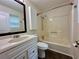 Bathroom featuring a single sink vanity and tub with shower at 485 Angham Rd, Hiram, GA 30141