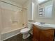 Bathroom features a single sink vanity and tub with shower at 485 Angham Rd, Hiram, GA 30141