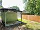 View of backyard shed and fence at 485 Angham Rd, Hiram, GA 30141
