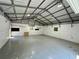 Spacious garage with high ceilings and ample room provides great potential for various uses at 485 Angham Rd, Hiram, GA 30141