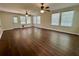 Spacious living room with lots of natural light and ceiling fans at 485 Angham Rd, Hiram, GA 30141