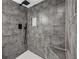 Modern bathroom featuring gray subway tile, a black shower head, and a built-in niche at 5153 Westbrook Pl, Union City, GA 30291