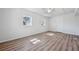 Bedroom with wood-look floors, natural light, and clean, white walls at 5153 Westbrook Pl, Union City, GA 30291