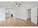 Open-concept living room features vaulted ceilings and wood flooring at 5153 Westbrook Pl, Union City, GA 30291