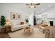 Bright living room featuring wood floors, modern decor, and an adjacent eat-in kitchen at 5153 Westbrook Pl, Union City, GA 30291
