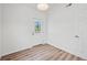 Inviting room with neutral walls, a bright window, and stylish wood-look flooring at 5153 Westbrook Pl, Union City, GA 30291