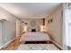 Cozy bedroom featuring a soft color palette, stylish decor, and hardwood floors at 6700 Roswell Rd # 22B, Atlanta, GA 30328