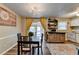 Bright dining area featuring table setting, modern lighting, and floating shelves at 6700 Roswell Rd # 22B, Atlanta, GA 30328