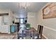 Open-concept layout, connecting the kitchen, dining area, and living room at 6700 Roswell Rd # 22B, Atlanta, GA 30328