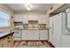 Well-lit kitchen featuring modern appliances, countertops, and lots of storage at 6700 Roswell Rd # 22B, Atlanta, GA 30328