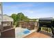 Outdoor deck with a grill and furniture perfect for relaxing and entertaining at 1221 Fountain Head Ct, Lawrenceville, GA 30043