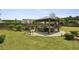 Spacious backyard with a lovely pergola, perfect for outdoor entertaining at 1221 Fountain Head Ct, Lawrenceville, GA 30043