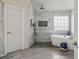 Modern bathroom featuring a standalone tub, tiled shower and neutral color palette at 1221 Fountain Head Ct, Lawrenceville, GA 30043