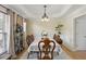 Cozy dining room with decorative shelving and recessed lighting at 1221 Fountain Head Ct, Lawrenceville, GA 30043