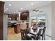 Eat in kitchen with cherry cabinets, stainless steel appliances, and backyard view at 1221 Fountain Head Ct, Lawrenceville, GA 30043