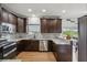 Updated kitchen with modern appliances, backsplash and light fixtures at 1221 Fountain Head Ct, Lawrenceville, GA 30043
