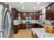 Modern kitchen featuring stainless steel appliances, granite countertops and ample cabinet space at 1221 Fountain Head Ct, Lawrenceville, GA 30043
