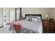 Comfortable main bedroom with ensuite bathroom and natural light at 1221 Fountain Head Ct, Lawrenceville, GA 30043