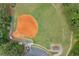Aerial shot of baseball field with parking and trees, highlighting recreational space within the community at 1820 Hunters Moon Dr, Alpharetta, GA 30005