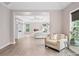 Spacious main bedroom with tray ceiling, fireplace, built-ins and seating area at 1820 Hunters Moon Dr, Alpharetta, GA 30005