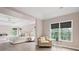 Spacious main bedroom featuring a tray ceiling, fireplace and sitting area at 1820 Hunters Moon Dr, Alpharetta, GA 30005