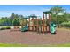 Community playground with slides and climbing structures set on a mulch base, perfect for Gathering fun and outdoor activity at 1820 Hunters Moon Dr, Alpharetta, GA 30005