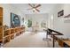 Light-filled bonus room features art studio space with built-ins and natural light at 35 Kenmare Hall Ne, Atlanta, GA 30324