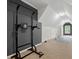 Large bonus room perfect for a gym space with access to attic storage at 35 Kenmare Hall Ne, Atlanta, GA 30324