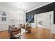 Stylish living room showcases a modern bar, elegant lighting, and an open layout for entertaining at 35 Kenmare Hall Ne, Atlanta, GA 30324