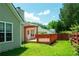 This backyard has a deck for entertaining and a fenced in yard for privacy at 4016 Meadow Glen Way, Fairburn, GA 30213