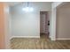 Cozy dining area with wood floors and elegant lighting, adjacent to the kitchen for easy serving at 4016 Meadow Glen Way, Fairburn, GA 30213