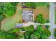 Expansive property features lush landscaping, a detached garage, and a private driveway at 4809 Highland Point Dr, Auburn, GA 30011