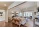 Cozy living room with ample seating, natural light, and a fireplace, creating a warm and inviting atmosphere at 4809 Highland Point Dr, Auburn, GA 30011