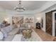 Spacious living room with comfortable seating, stylish decor, and open layout at 4809 Highland Point Dr, Auburn, GA 30011