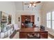 Spacious home office featuring built-in shelving, plantation shutters, and a generous workspace for productivity at 4809 Highland Point Dr, Auburn, GA 30011