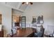 Well-appointed home office with a vaulted ceiling, custom desk, and refined decor elements at 4809 Highland Point Dr, Auburn, GA 30011