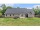 The home has a spacious backyard with a trampoline and patio at 220 Windpher Rdg, Hampton, GA 30228
