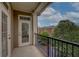 Private balcony with railing offers outdoor space and views of the surrounding community at 2300 Peachford Rd # 3411, Dunwoody, GA 30338
