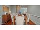Elegant dining room with wood table, upholstered chairs, and traditional furnishings for sophisticated dining experiences at 2300 Peachford Rd # 3411, Dunwoody, GA 30338