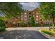 Beautiful brick building with well-maintained landscaping in a desirable community at 2300 Peachford Rd # 3411, Dunwoody, GA 30338