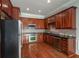 Updated kitchen with stainless steel appliances and custom cabinetry at 2300 Peachford Rd # 3411, Dunwoody, GA 30338